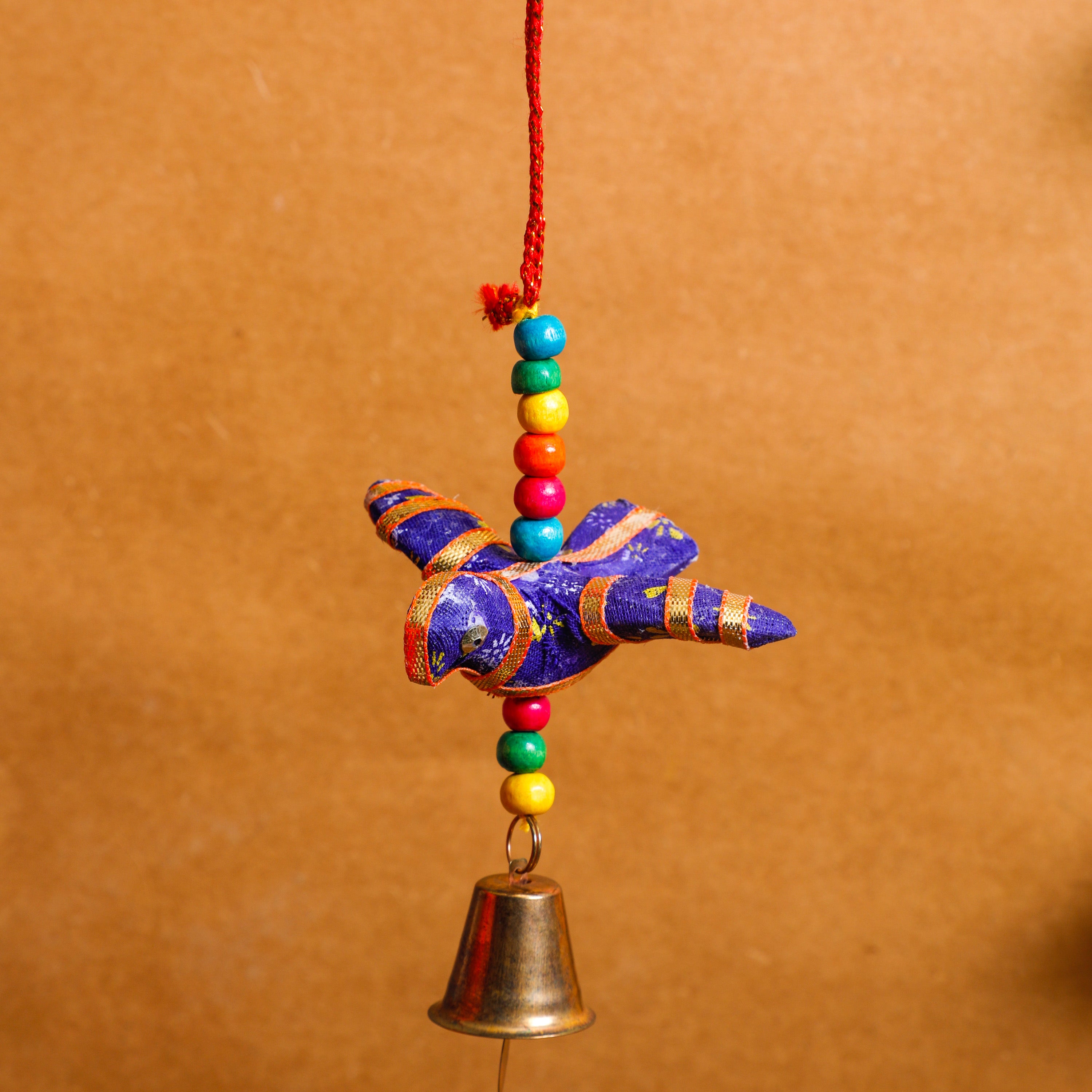 Fabric and beads made prospertiy hanging