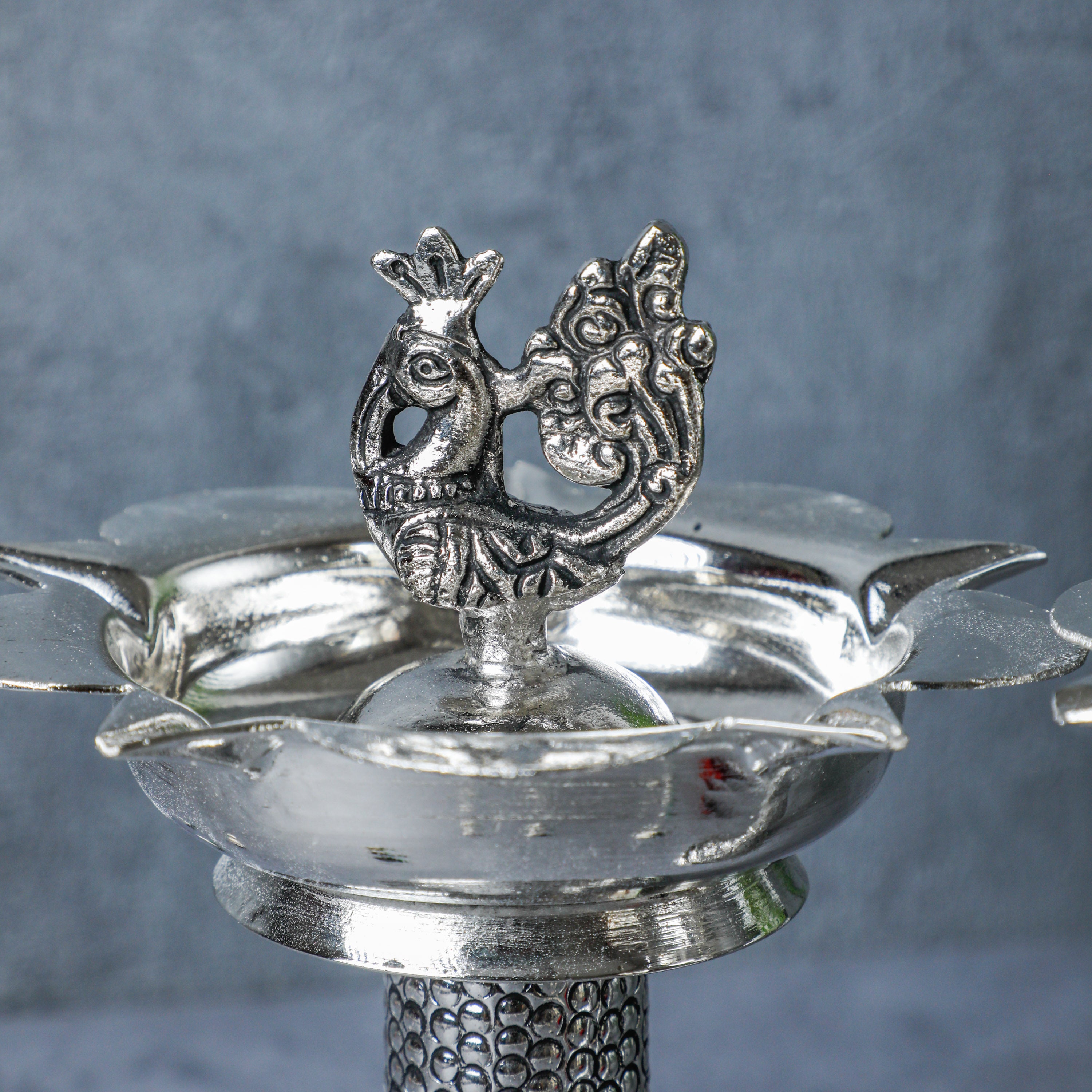 This peacock shaped diya is suitable for pooja and other auspicious occasions.