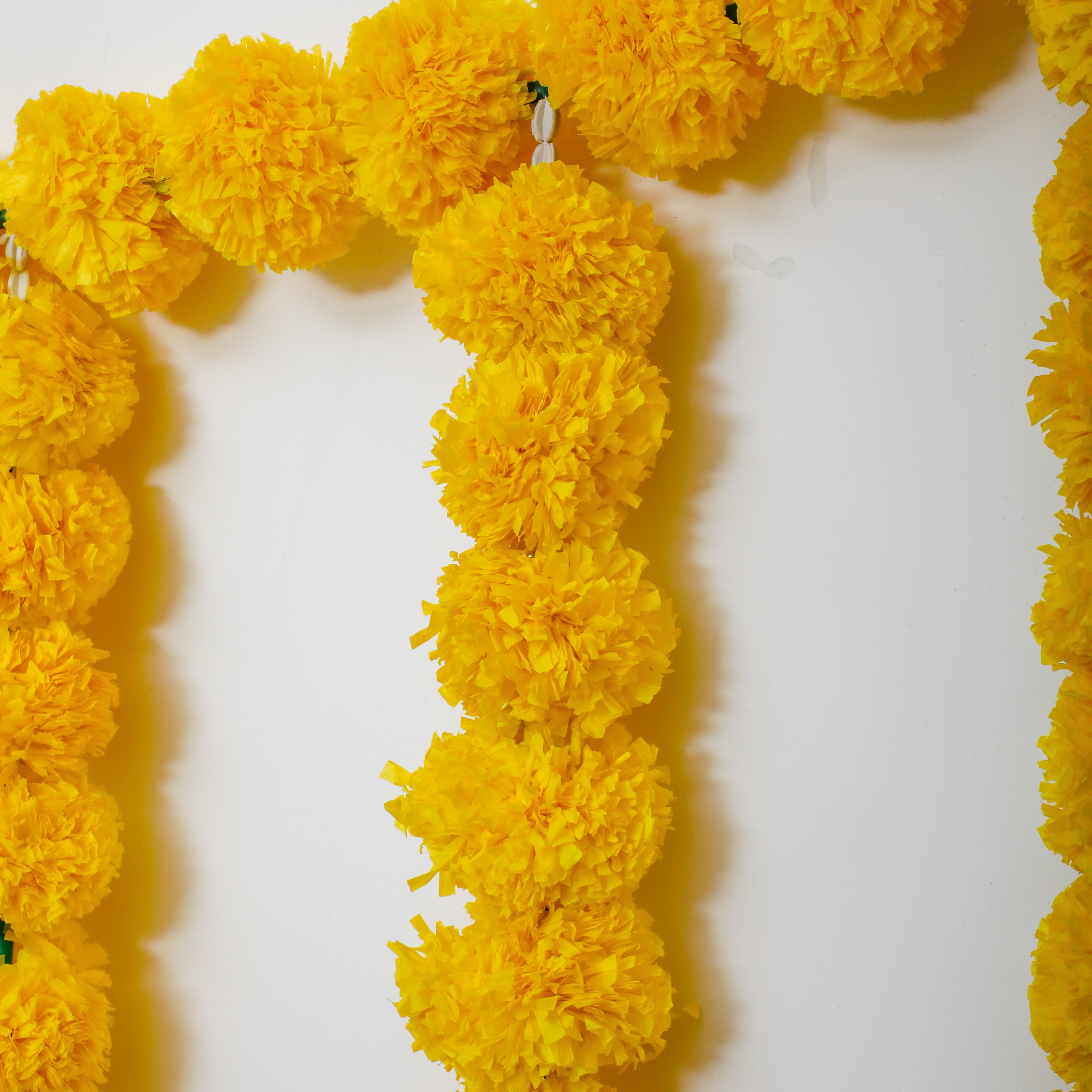 Vibrant Yellow Toran adorned with Marigold Flowers - Traditional Indian Home Decor for Festive Ambiance