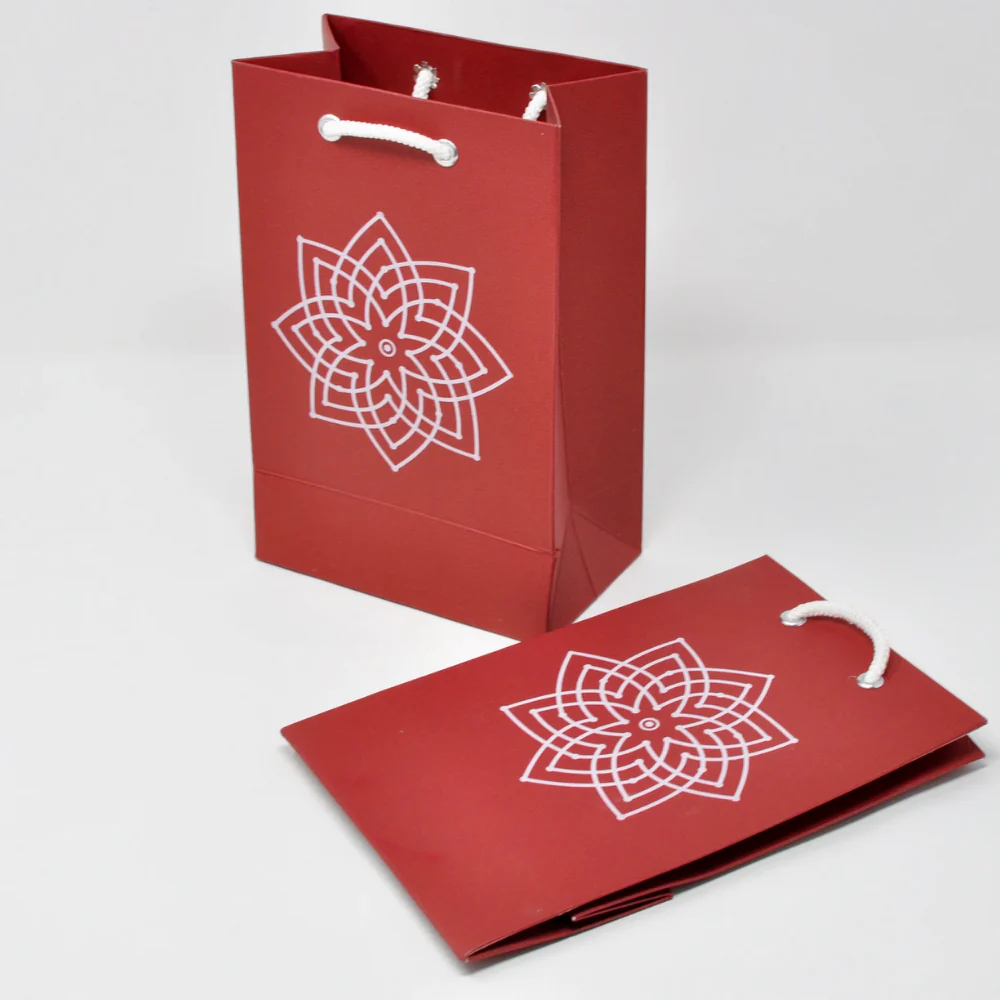 high quality paper bags with kamalam print on it