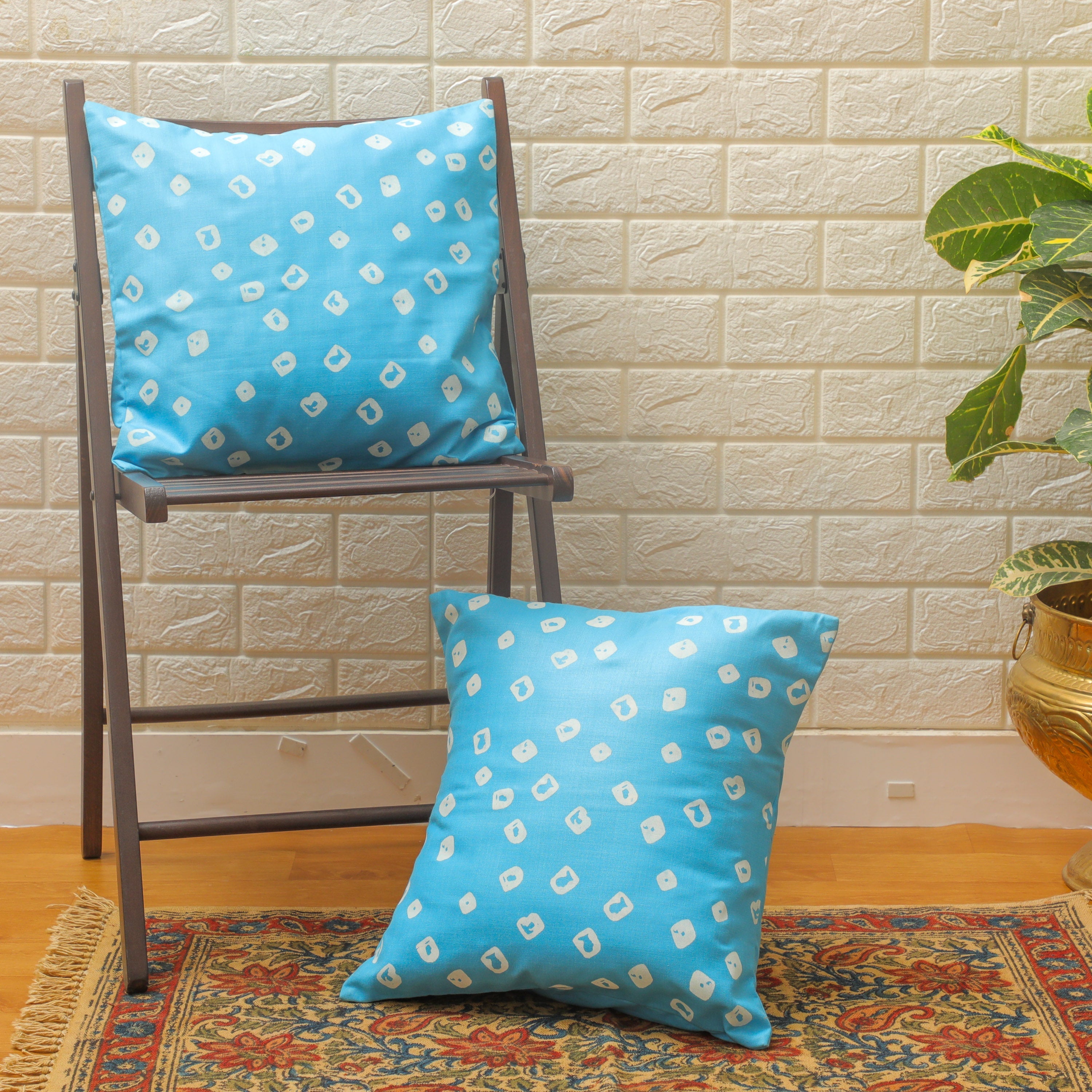 blue cushion is the perfect addition to any room in need of a colorful update