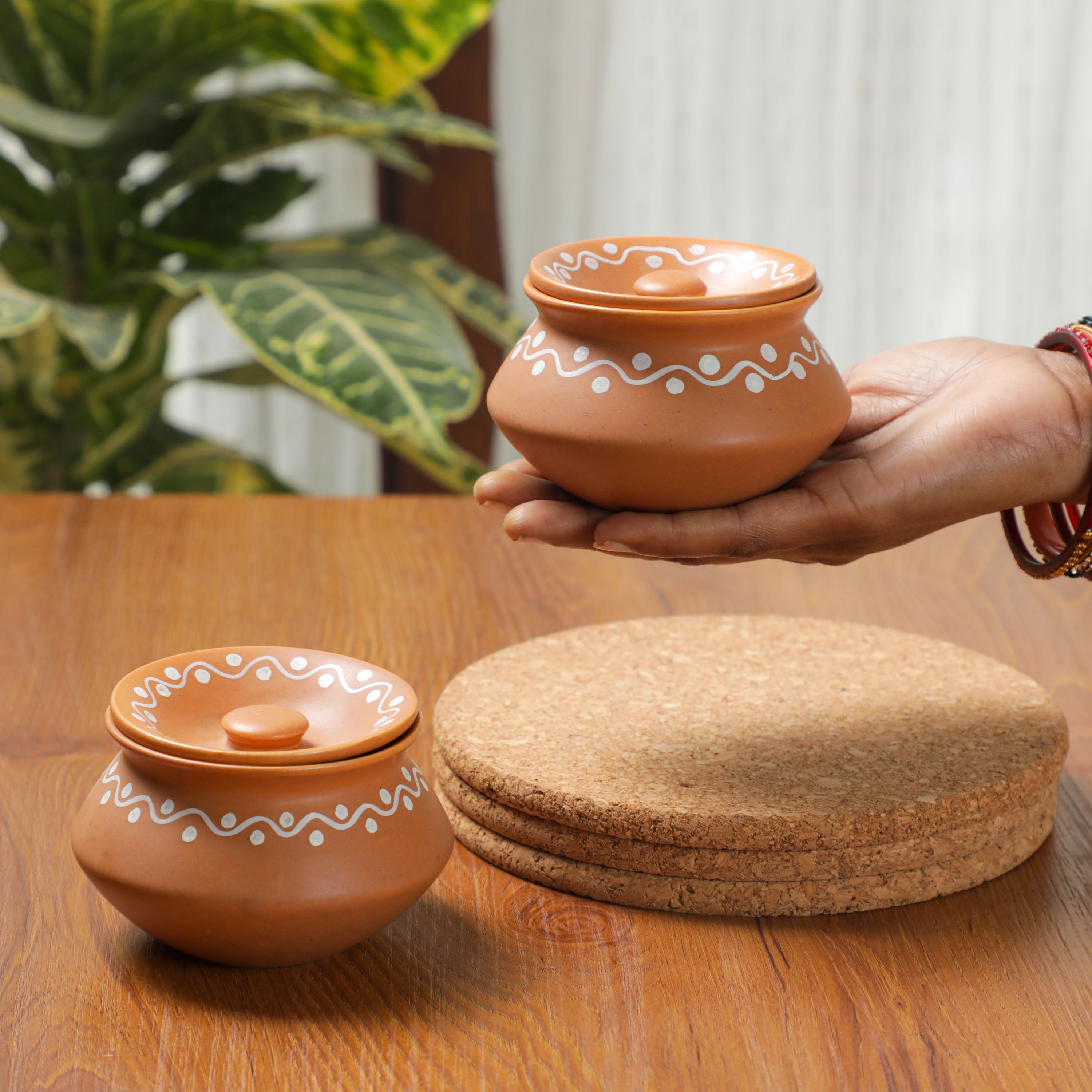 rangoli designed handi for cooking