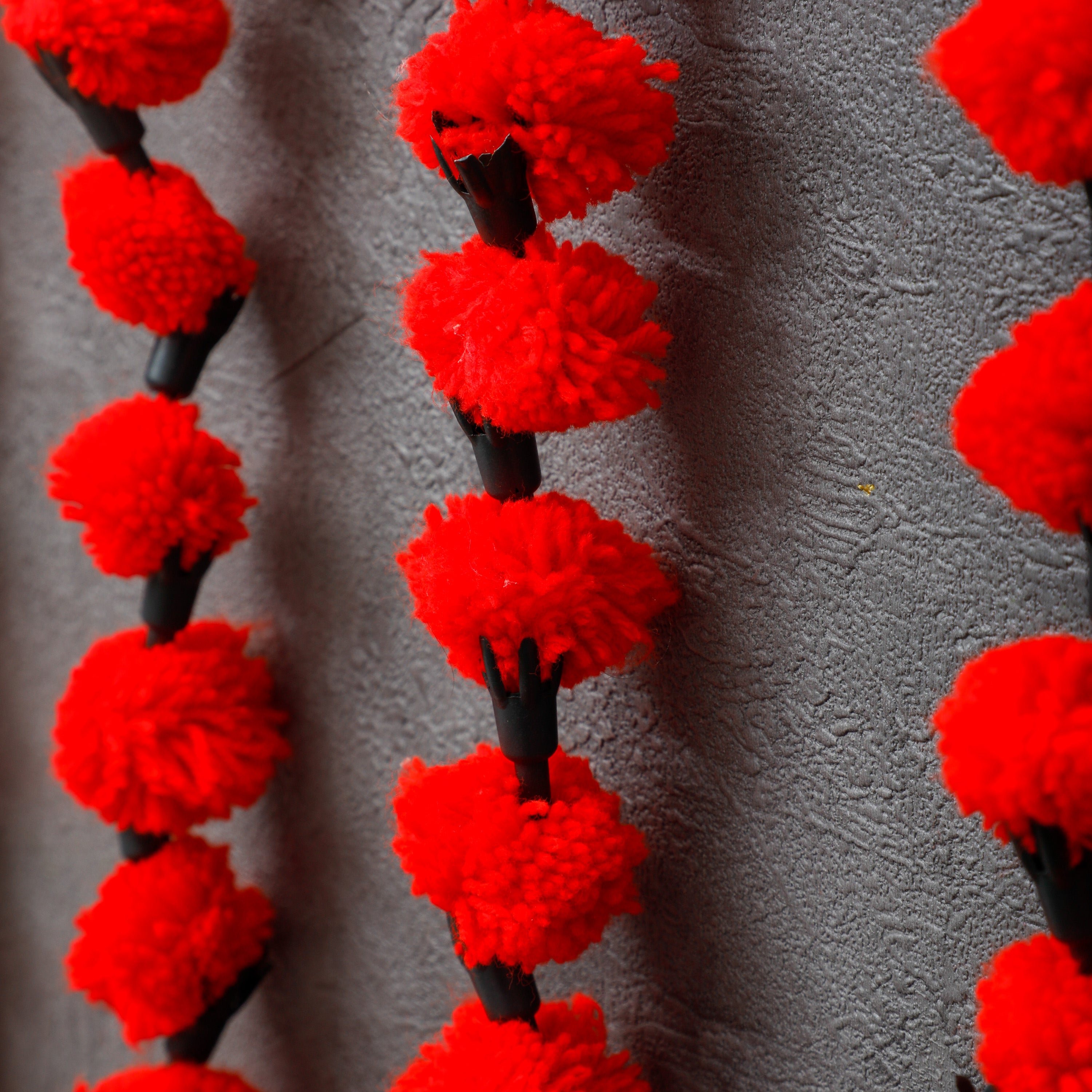 Artisan-crafted woolen garlands