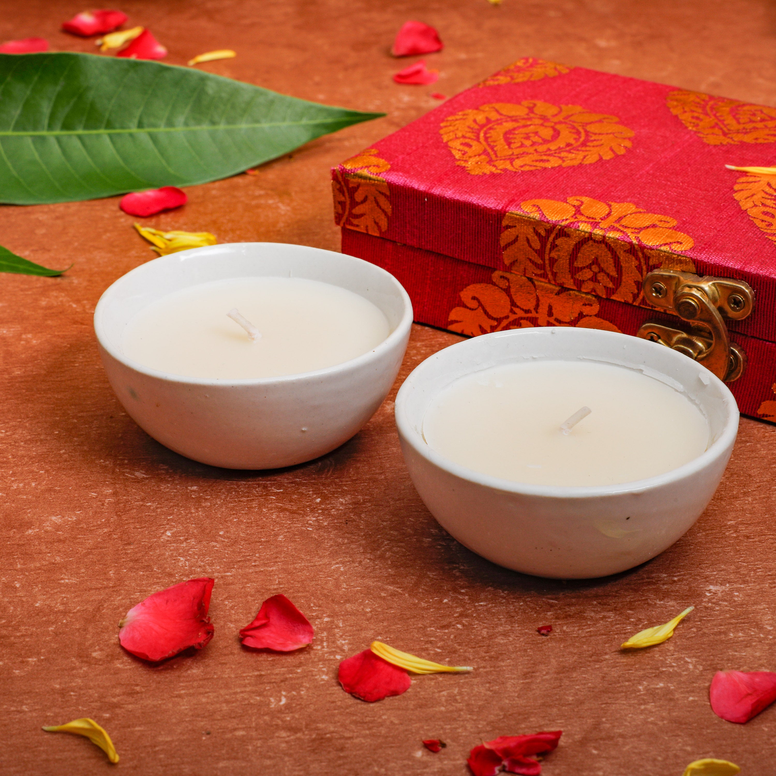 Aromatic scented candles filled in ceramic bowl