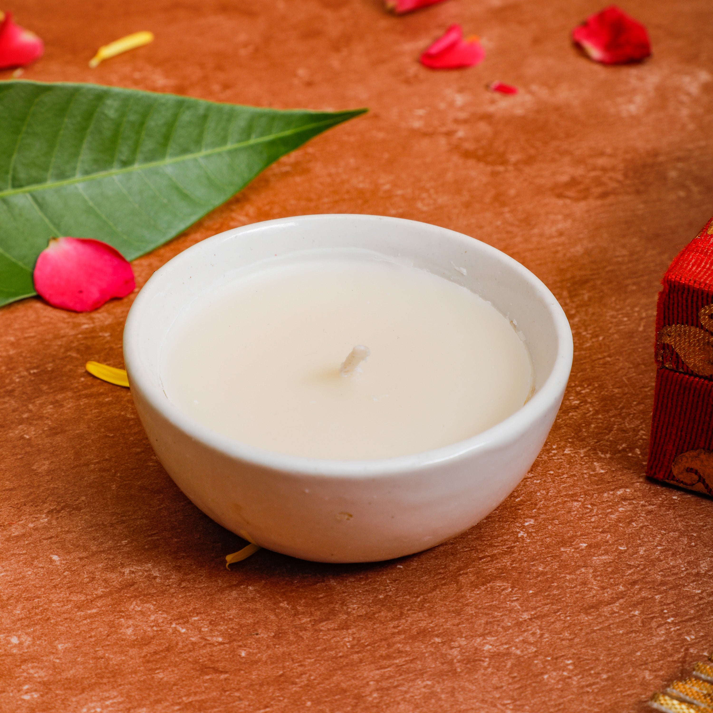 Scented candle in ceramic jar