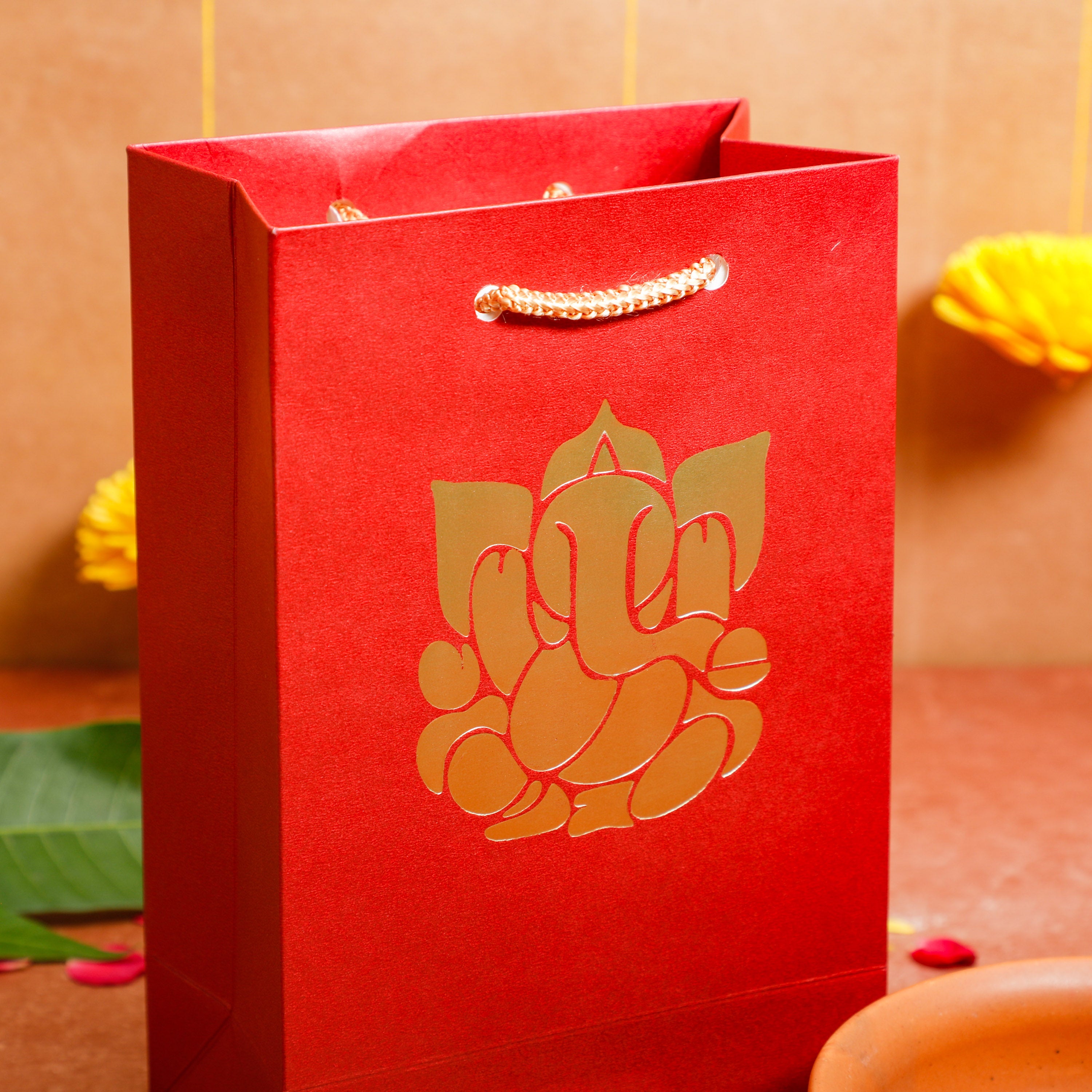 Sturdy red color paper bag with ganesha design