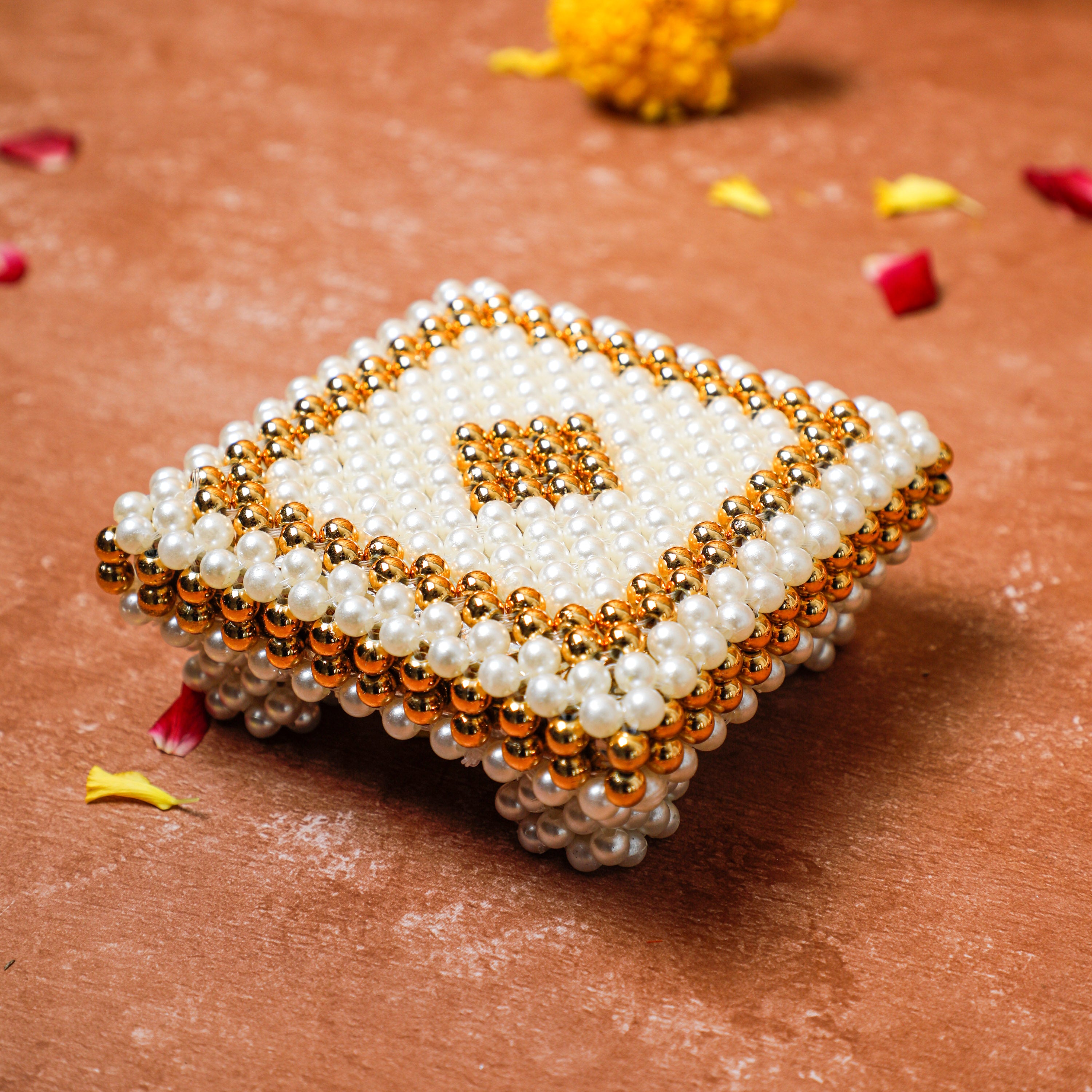 This chowki comes in square shape with beautiful design