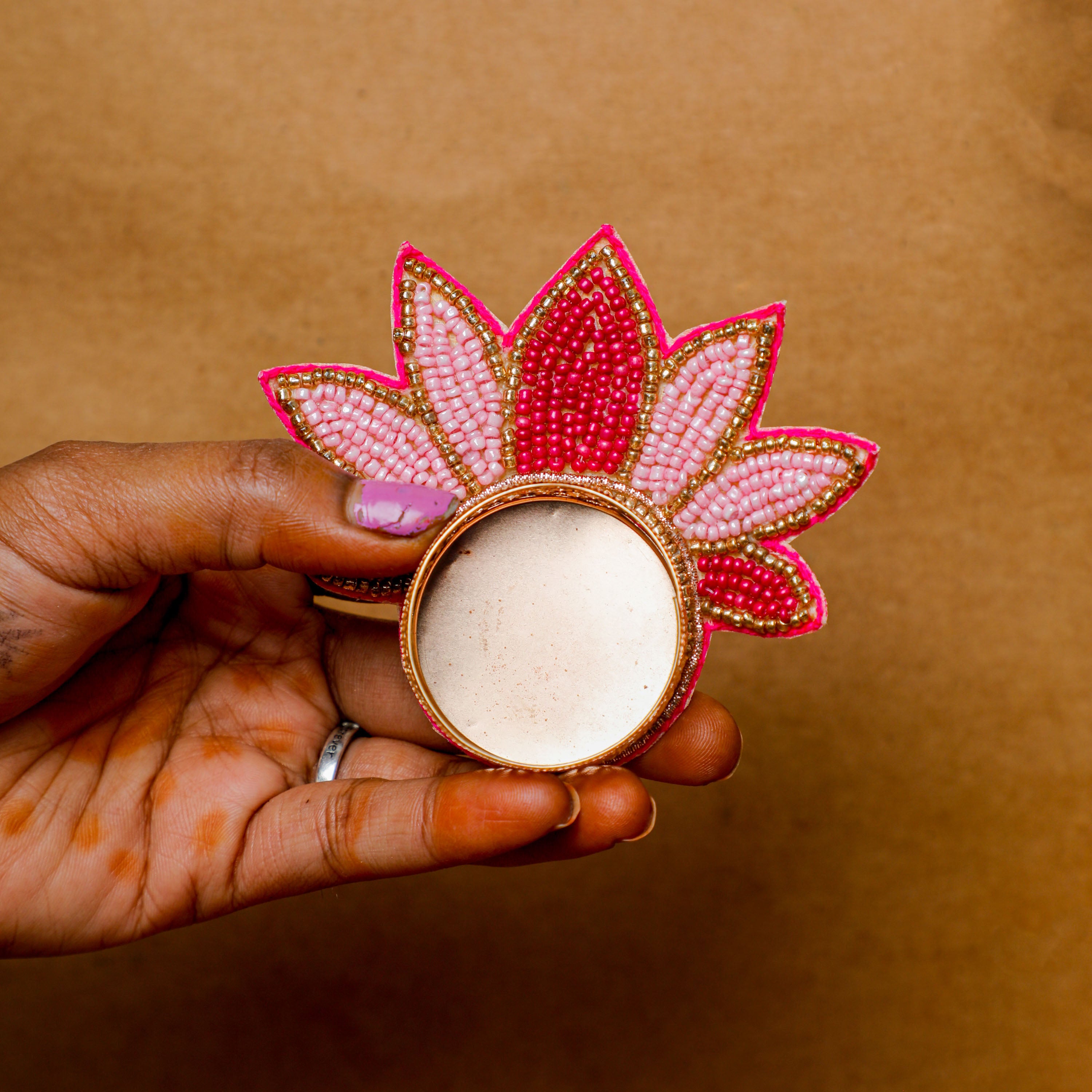 Pink lotus tealight candle holders are ideal for enhancing your Diwali decorations