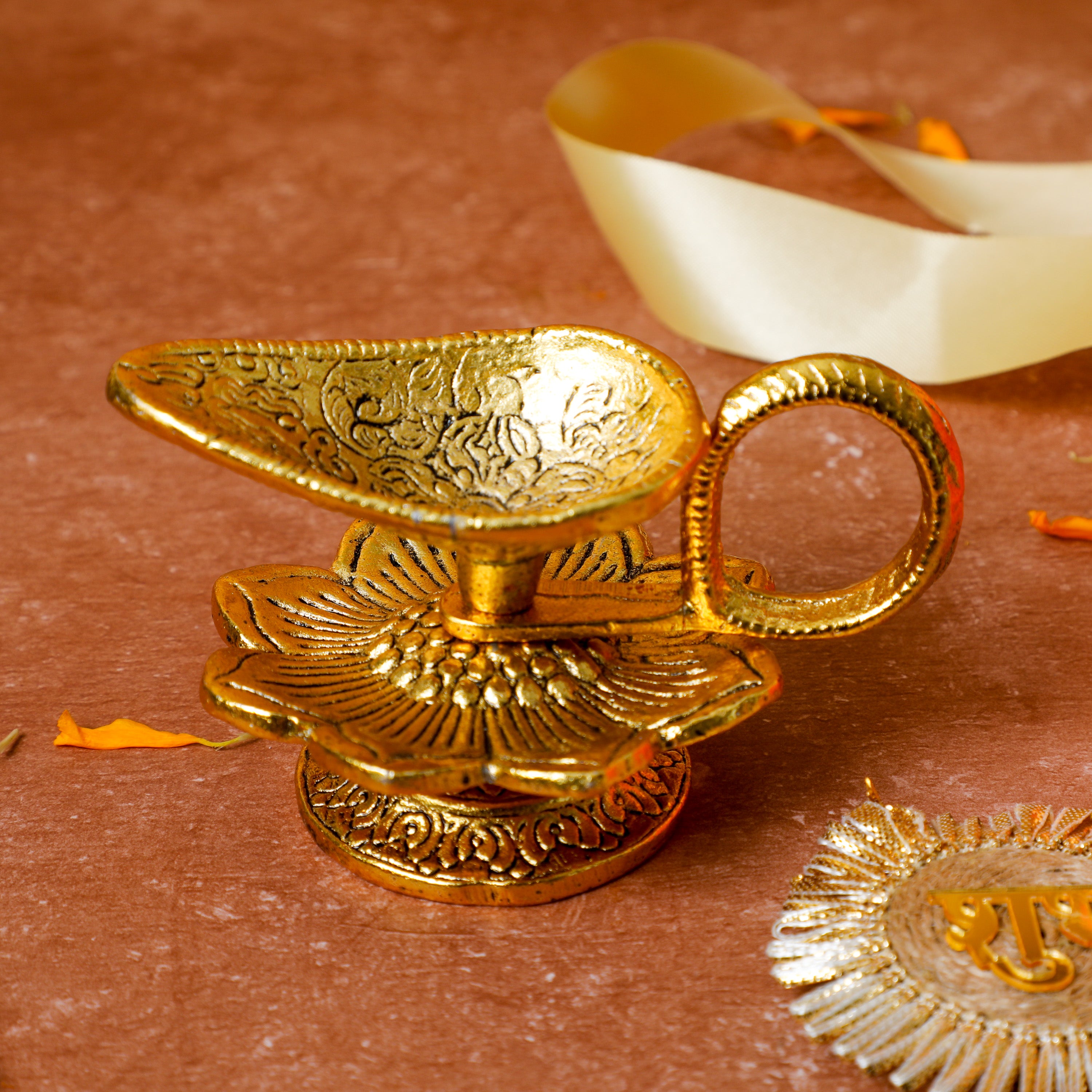 wick aarti made of high quality metal alloy is intricately engraved with beautiful traditional design