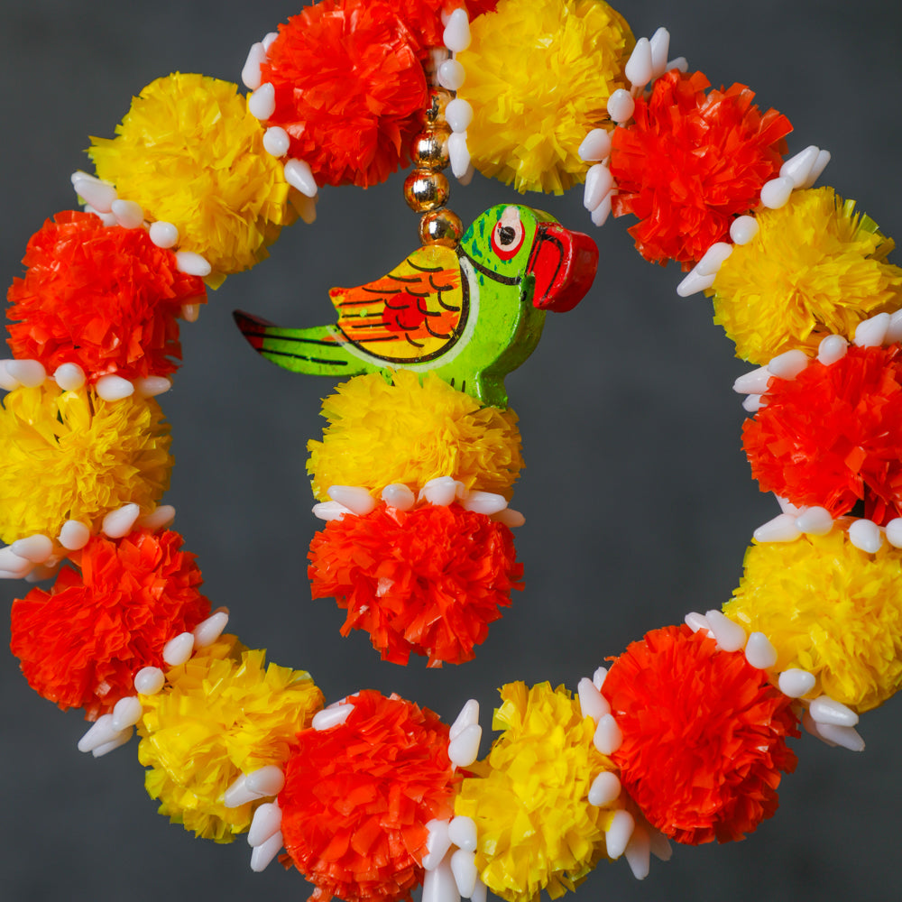 our wooden parrot garland, where each parrot is carefully painted by skilled artisans. A lovely mix of craftsmanship and vibrant colors