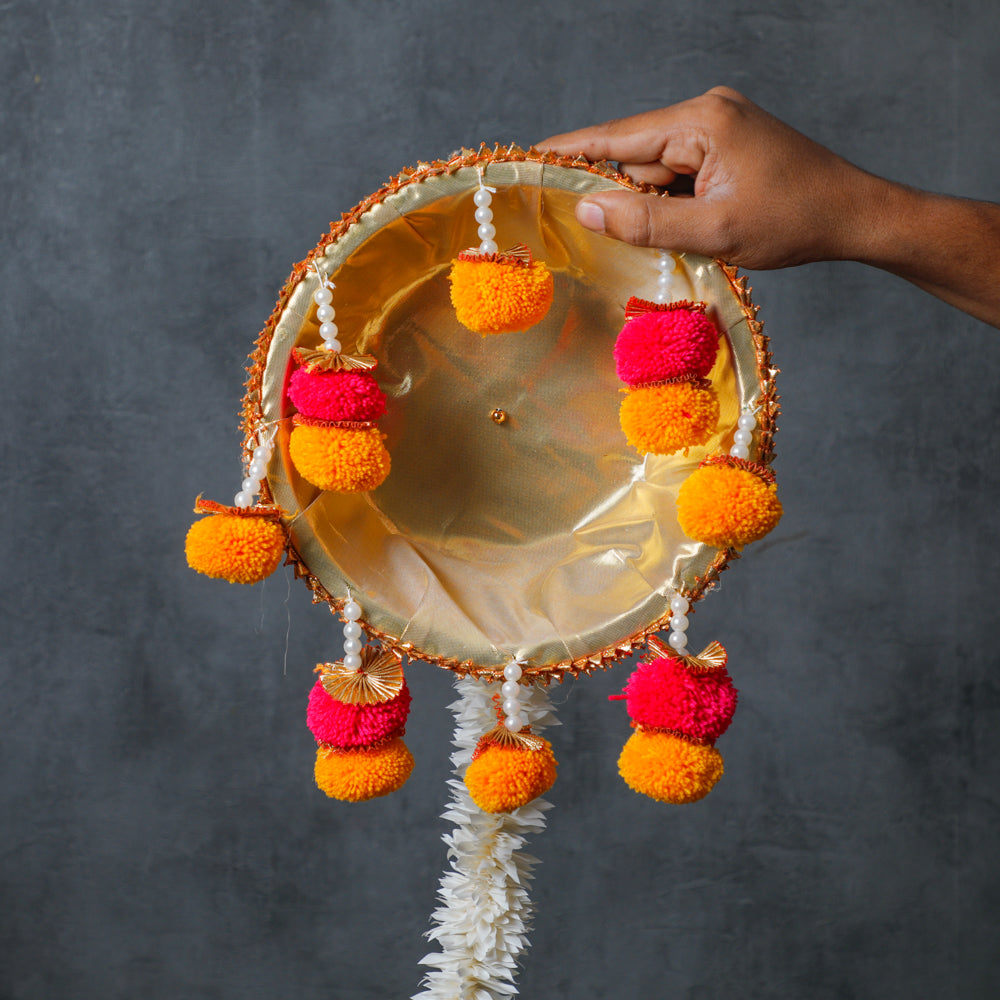 The Hangings are made out of cloth, beads, Pompom
