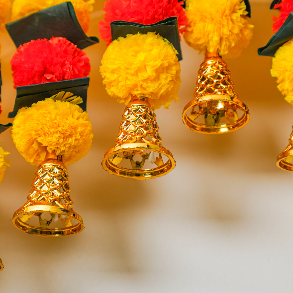 he vibrant artificial marigold flowers and golden-coated hanging bells make it a standout choice for festive decoration