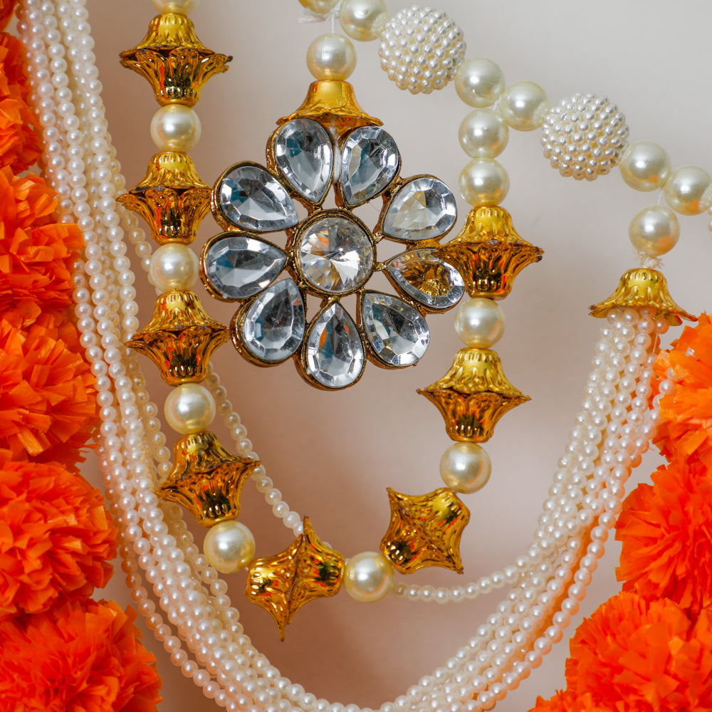 The Torans are created in pearls and studded stones to give Goddess Lakshmi the warmest of welcomes.