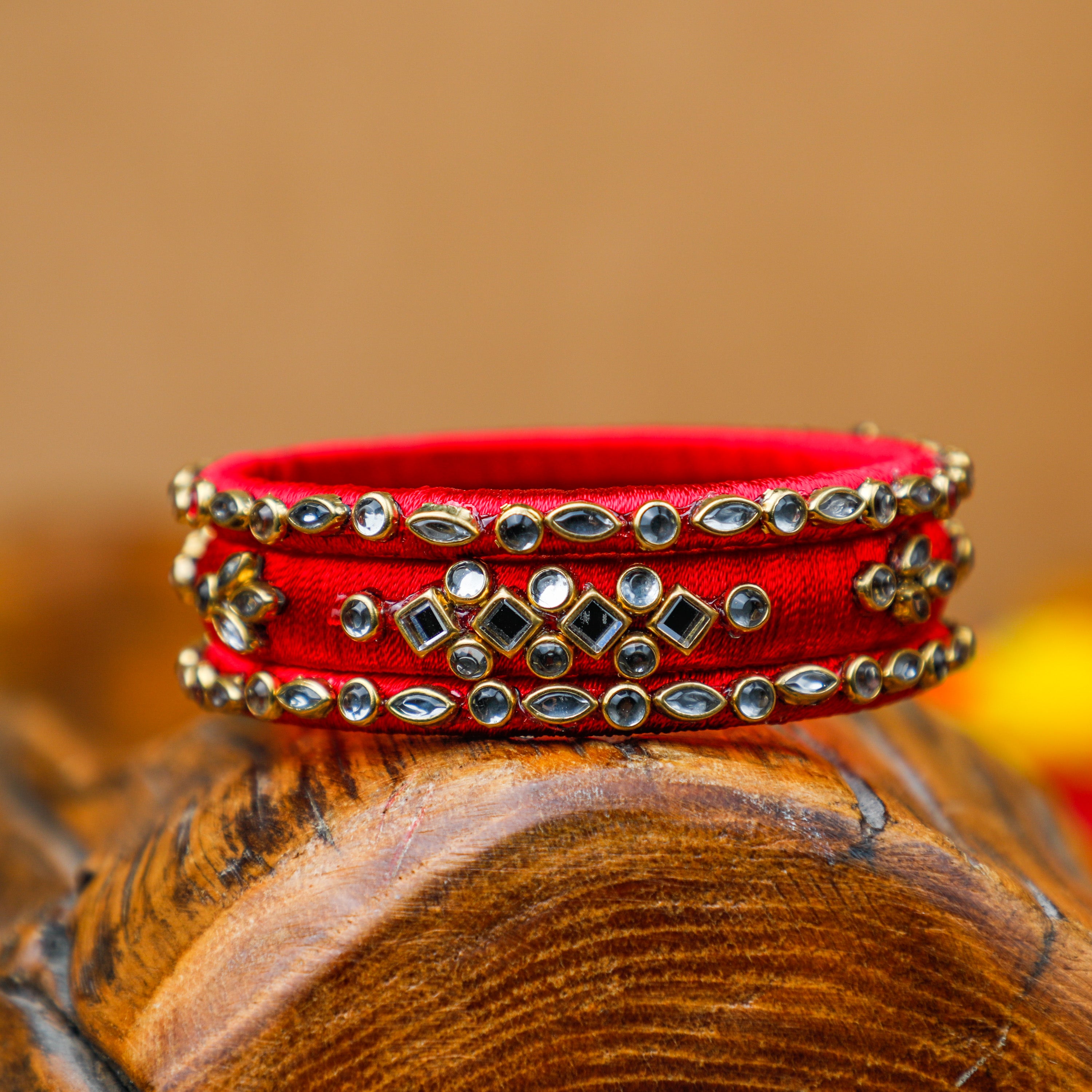 intricately designed bangles that sparkle with Kundan stones