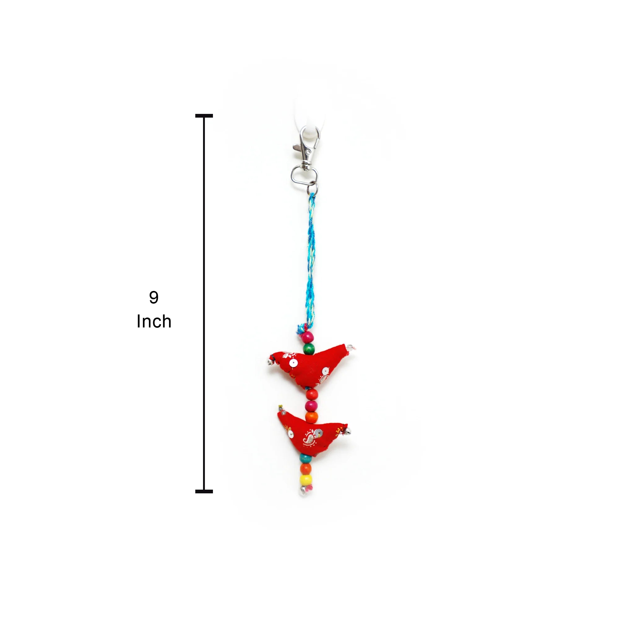 A hanging decorative charm or bag charm shown on a white background with a vertical measurement marker indicating 9 inch length. The charm has a silver clasp, a blue beaded string, and two red bird figures with small multicolored bead accents.