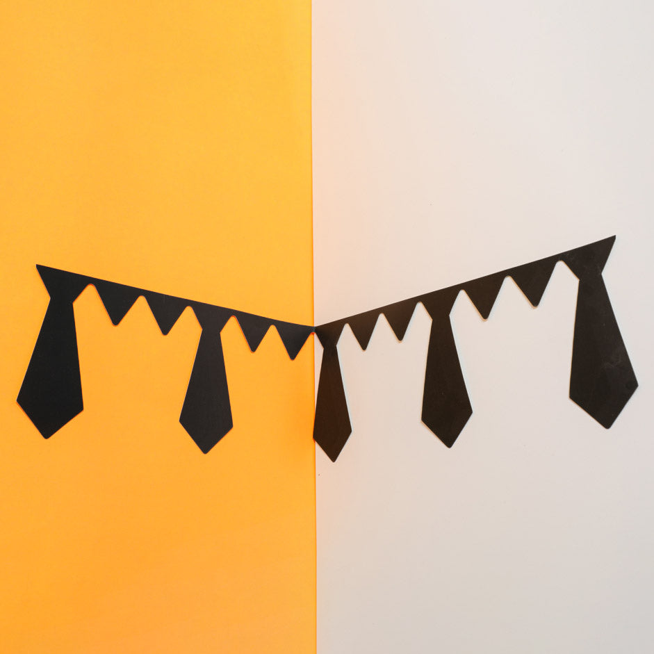 Tie shaped cutouts for Annaprasana Ceremony Decor