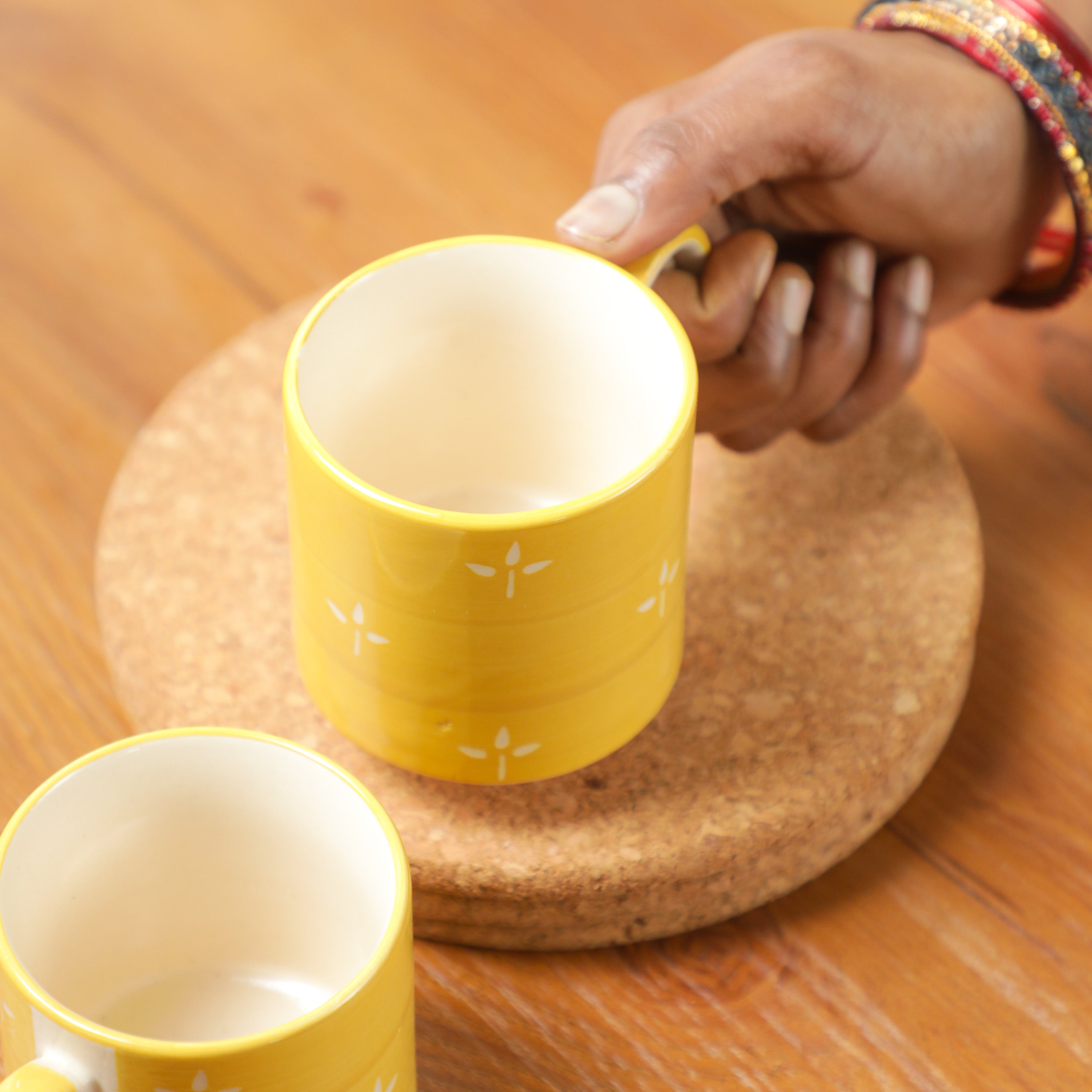 teacups in yellow color