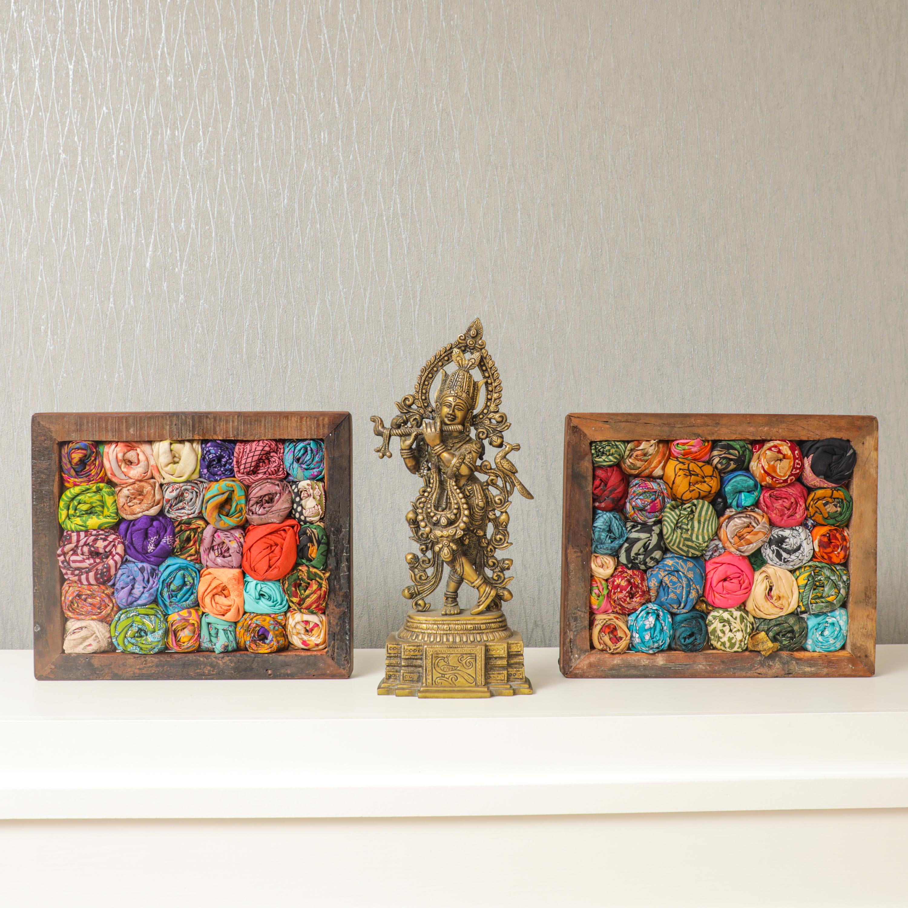 indian textile frames on the fire wood