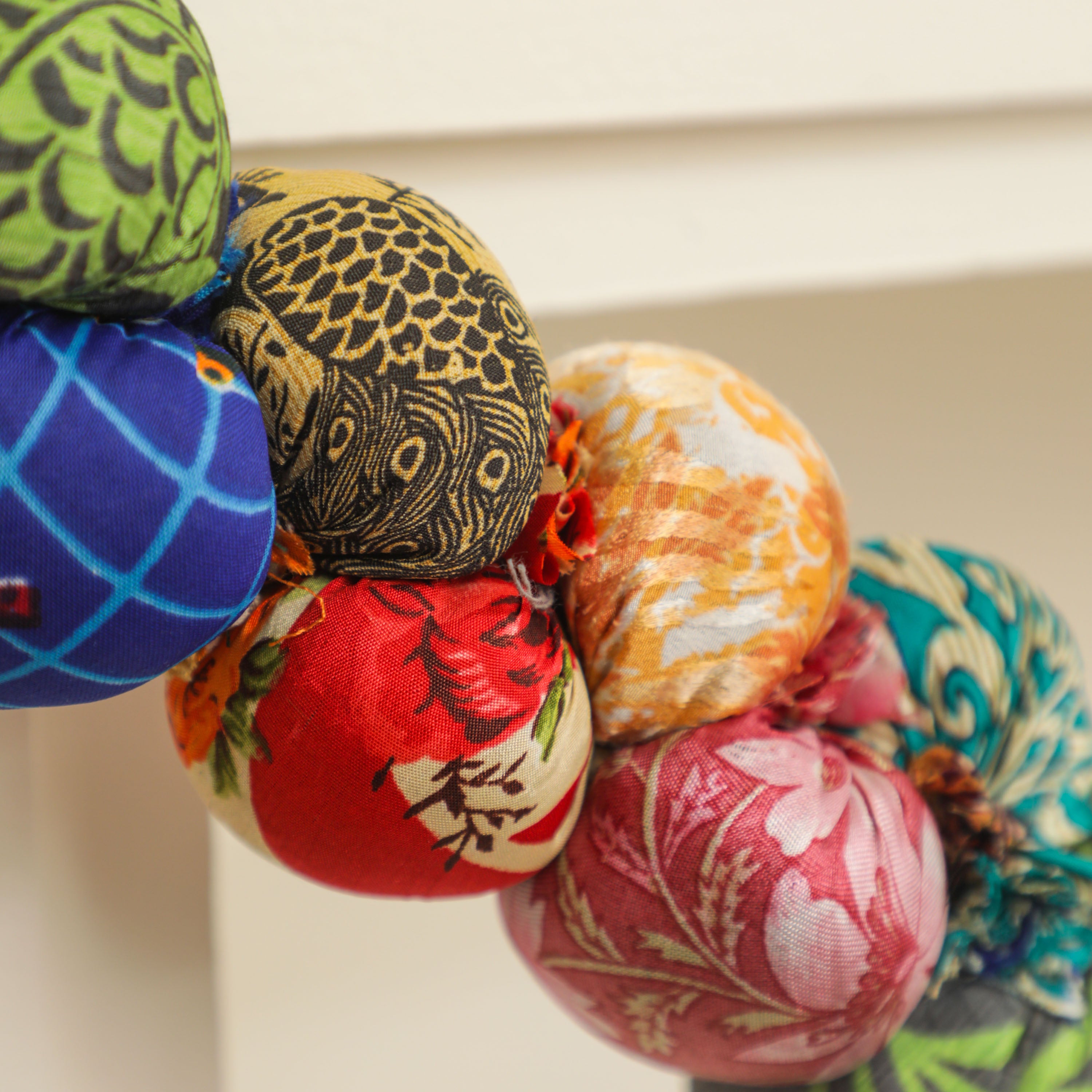 bead by bead hand stiched garlands from recycled saree scraps