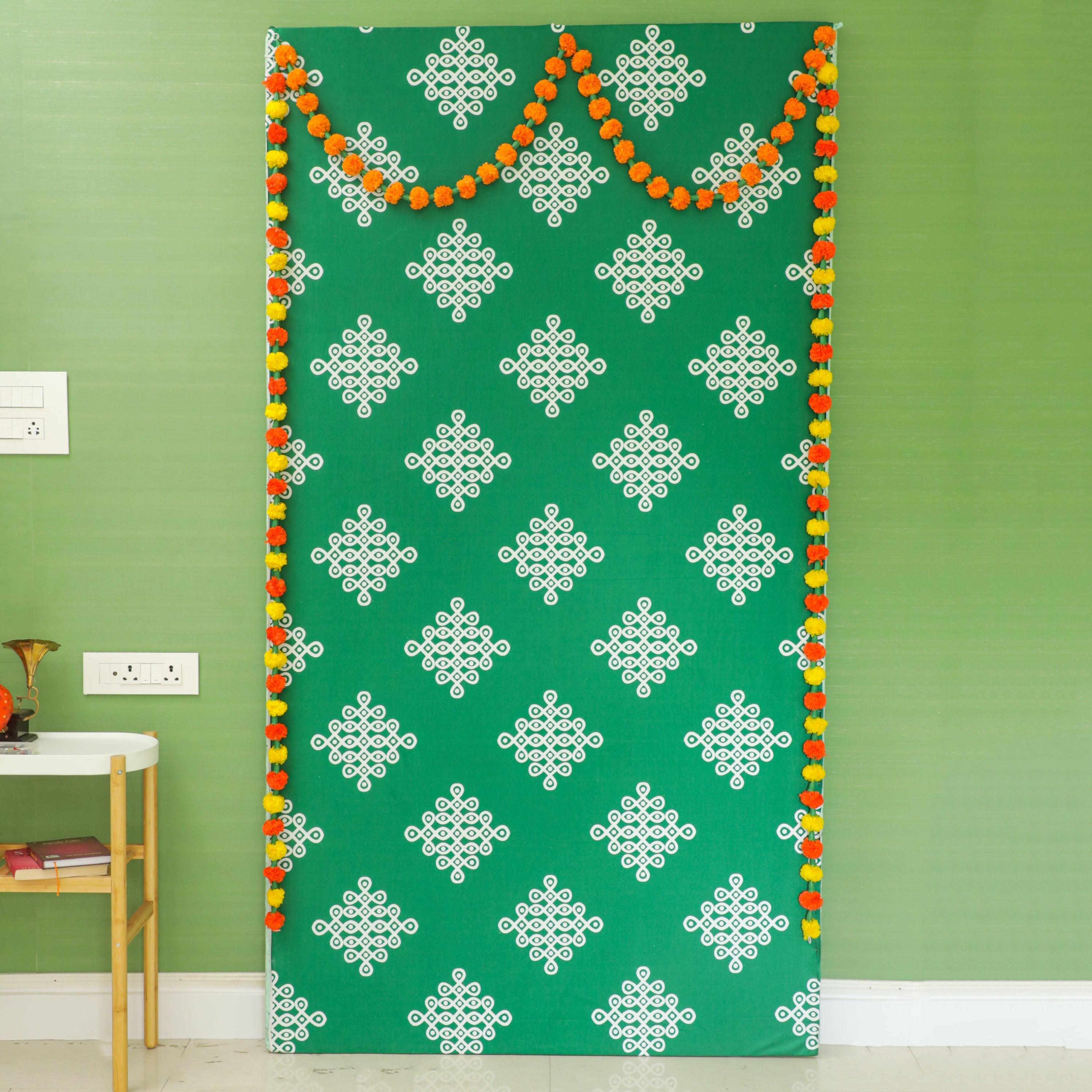 Muggu Backdrop Cloth with hanging garlands