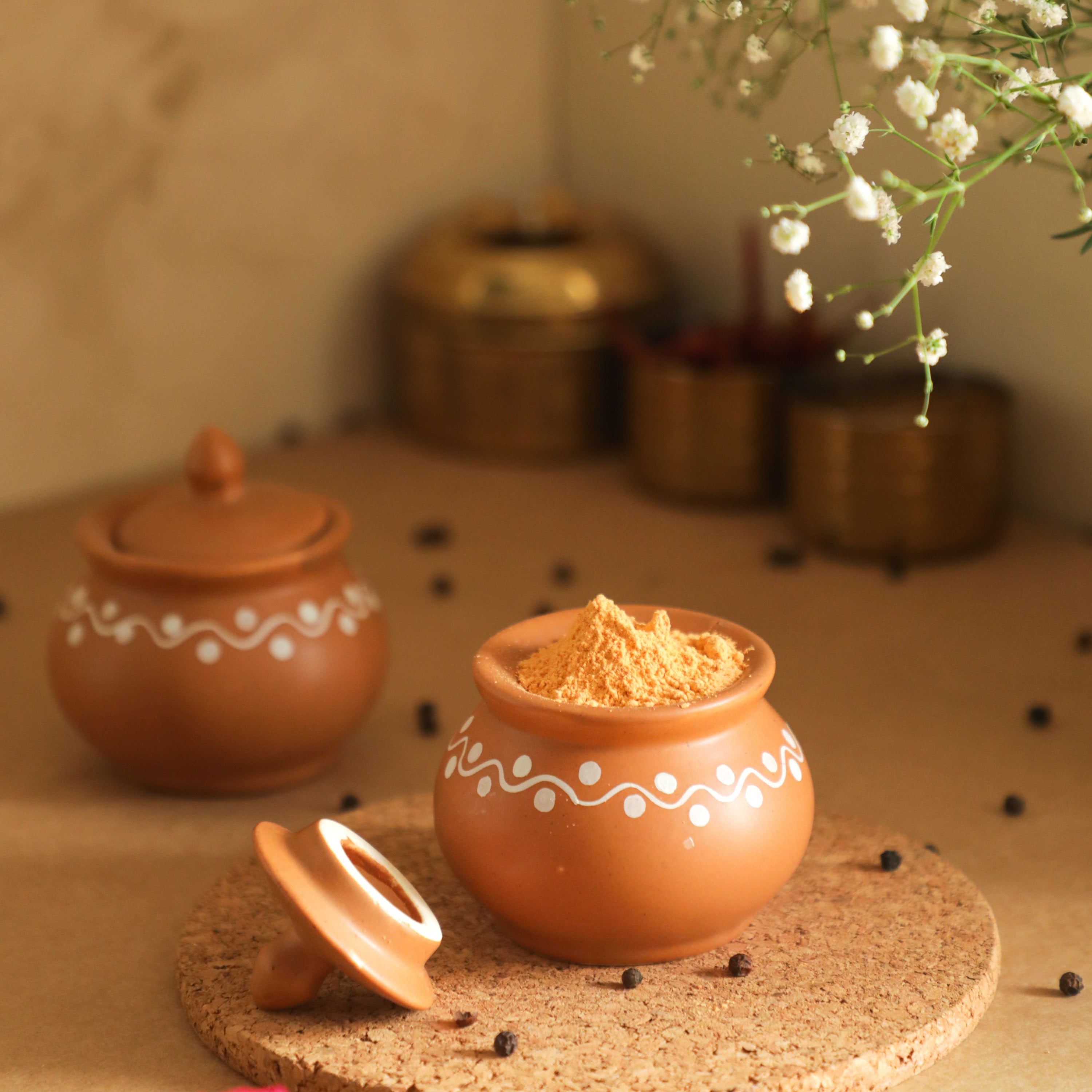 ceramic jar filled with spices