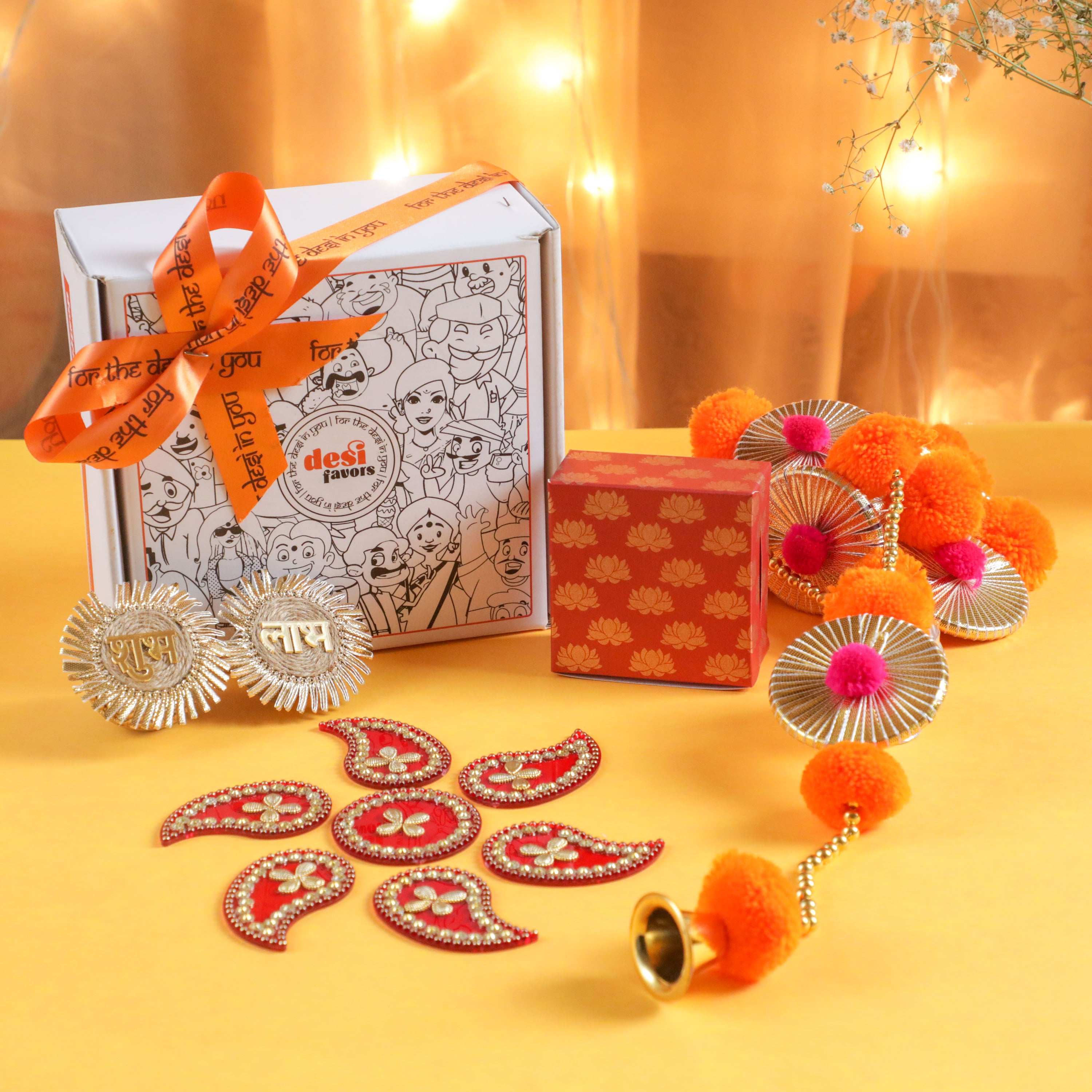 A unique diwali party style gift hampers with pompom garlands