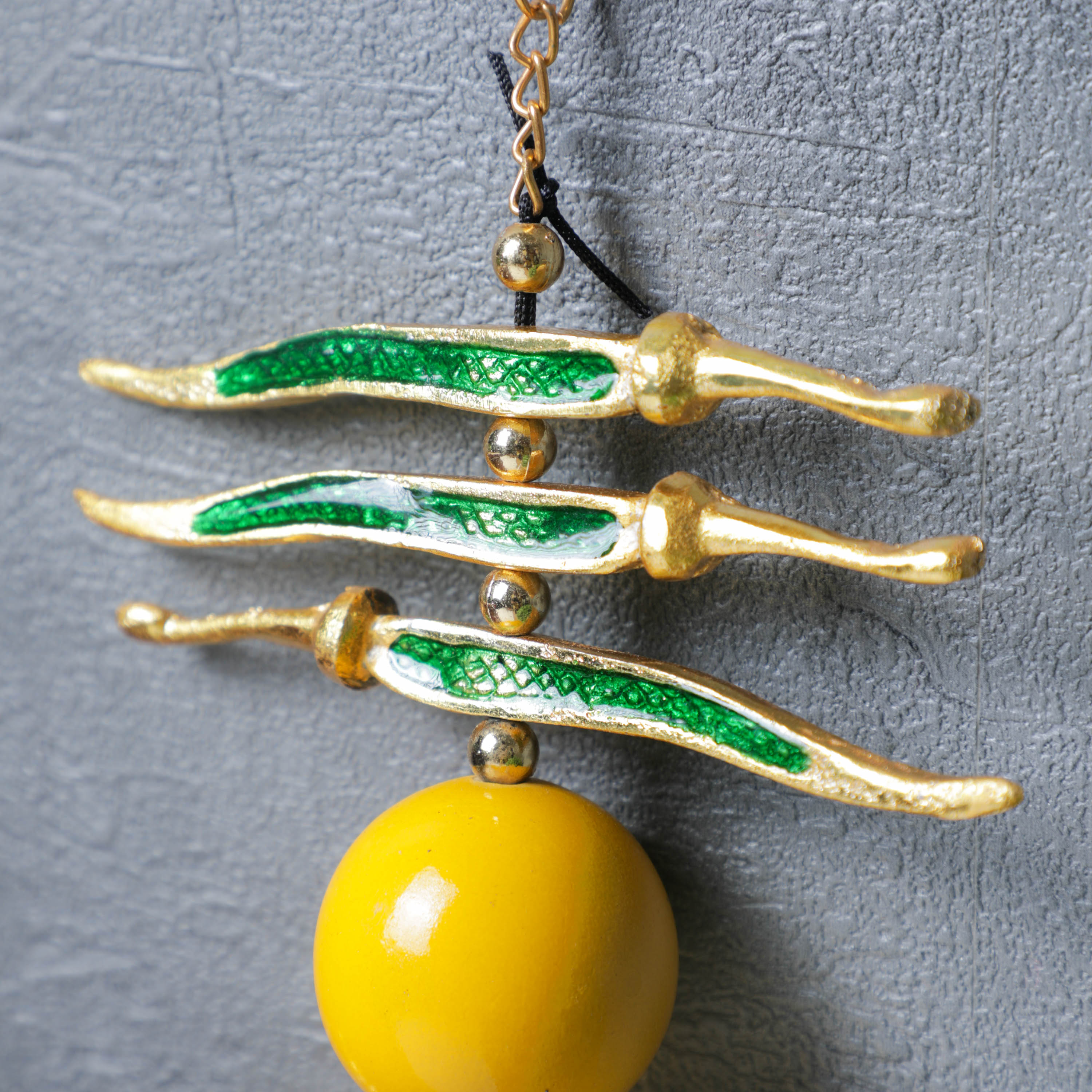 Gold Plated wall hanging with Green chilies and yellow lemon