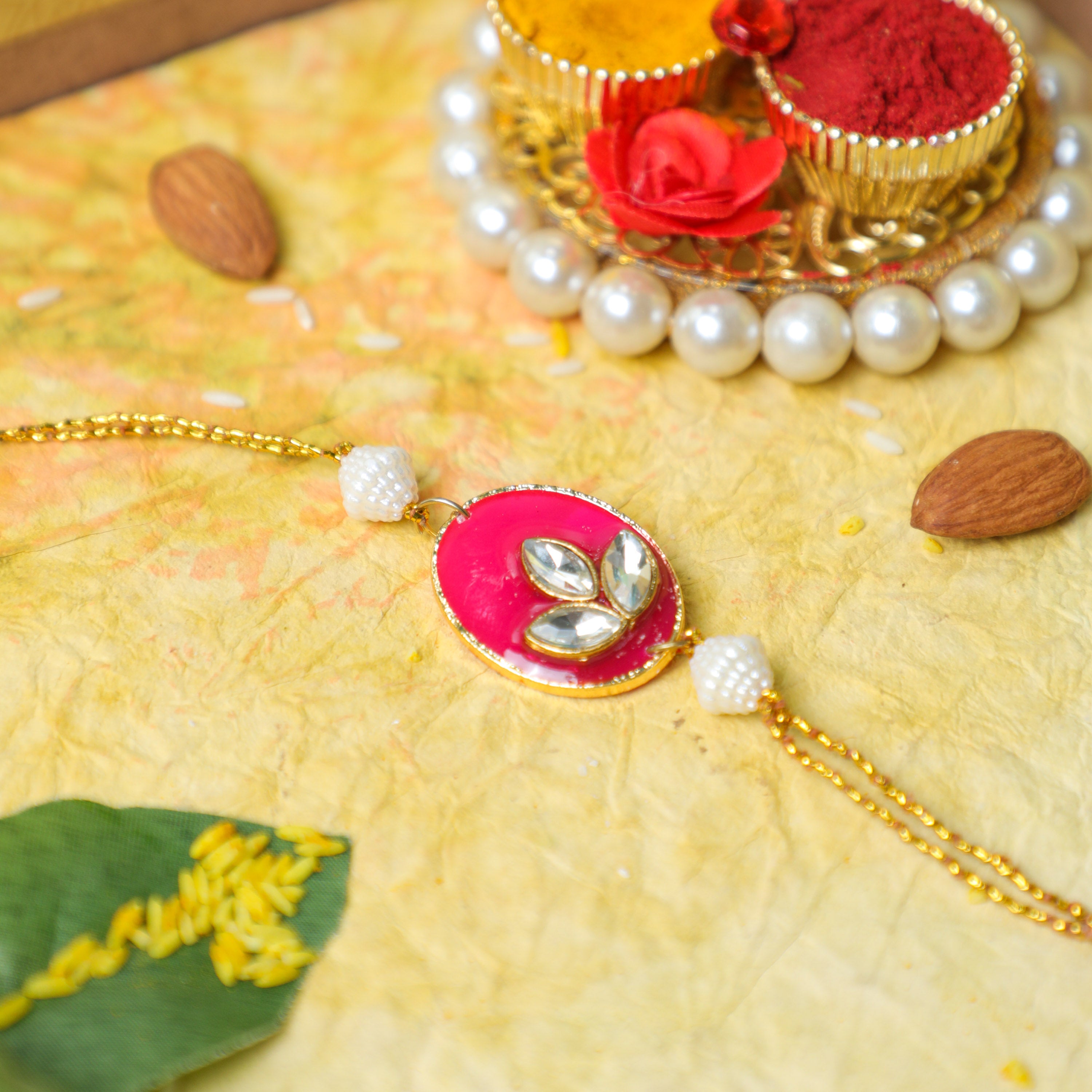 Exquisite Pearl and Pink Kundan Enamel Rakhi