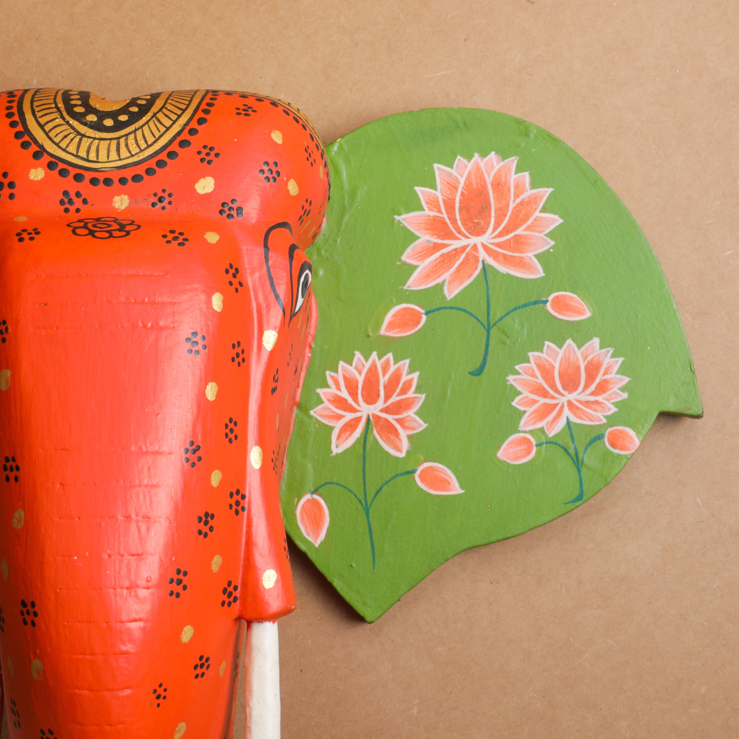 a colorful wooden elephant for home decor