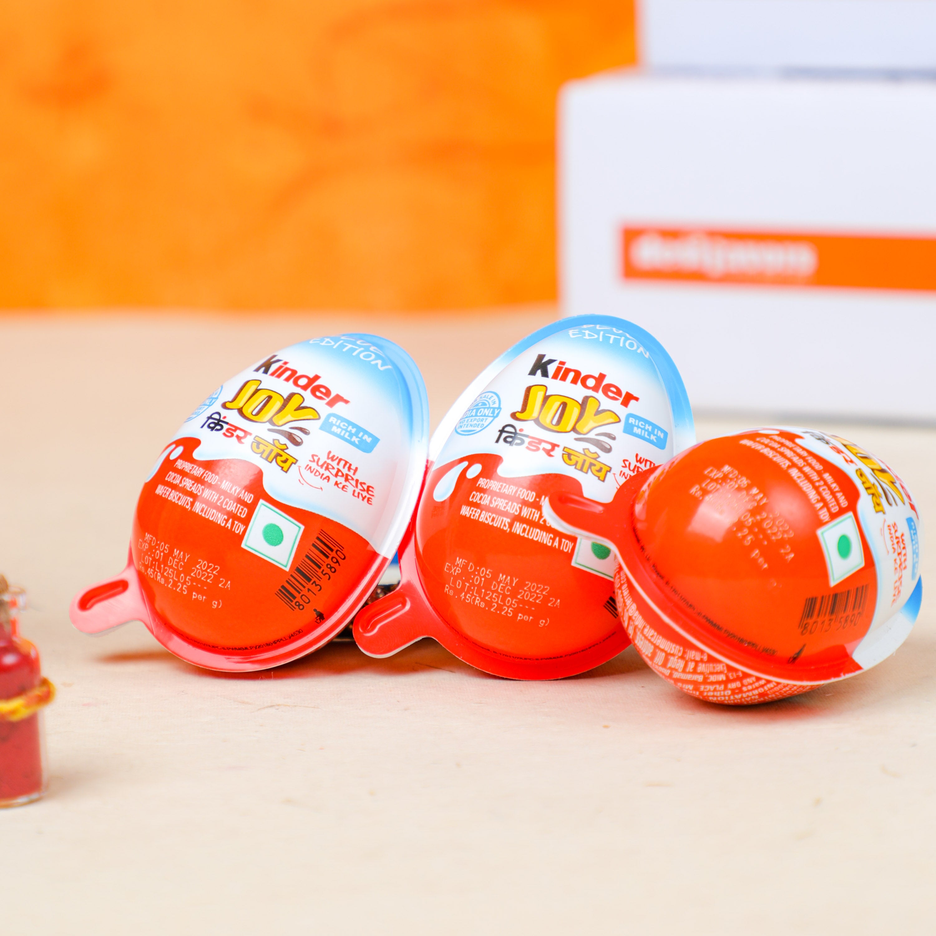 3 Kinder Joy with Pearl Rakhi and Roli-Chawal
