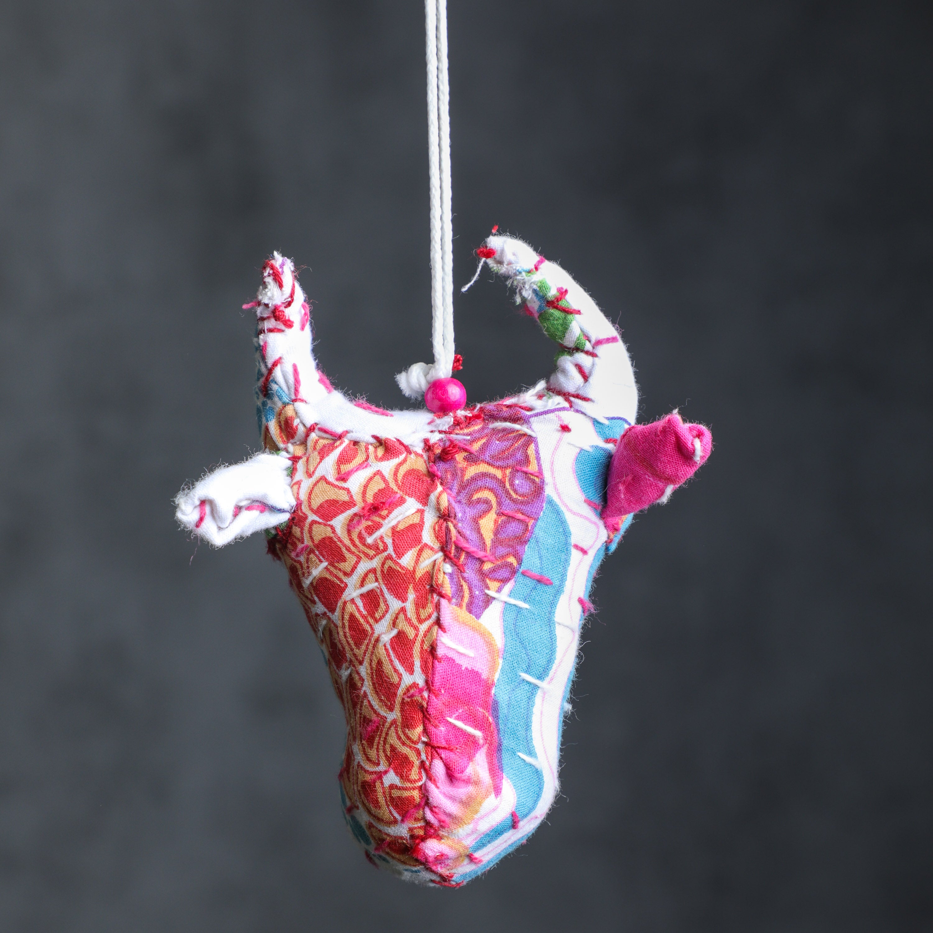 A beautiful white color charm for purse