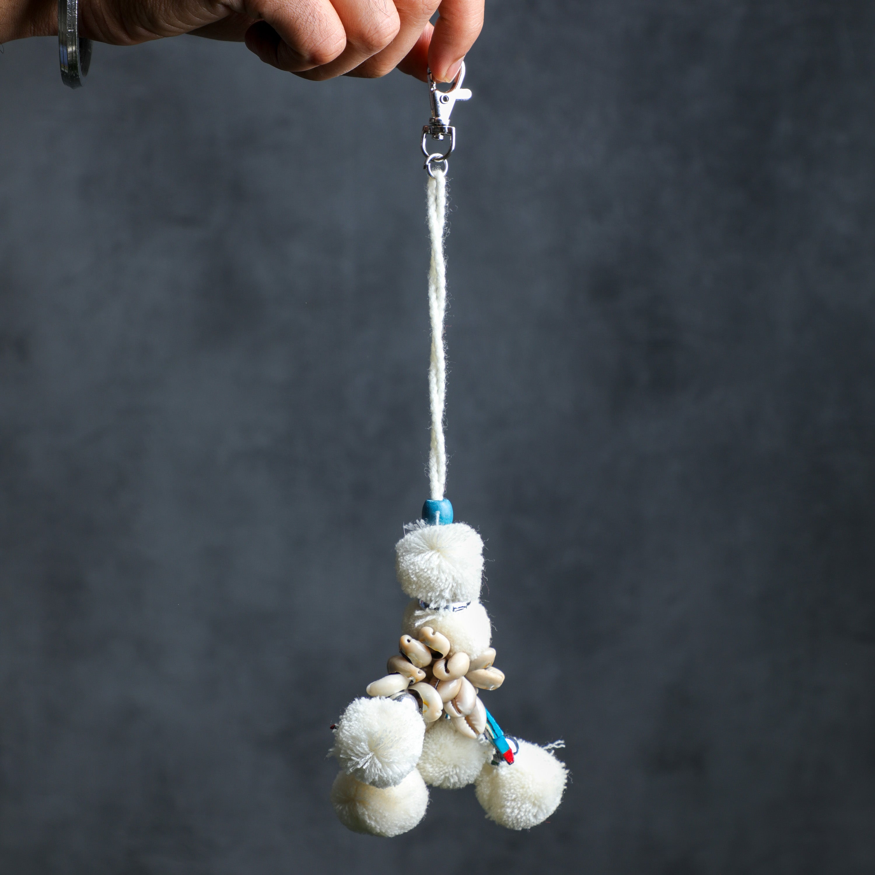 holding purse charms