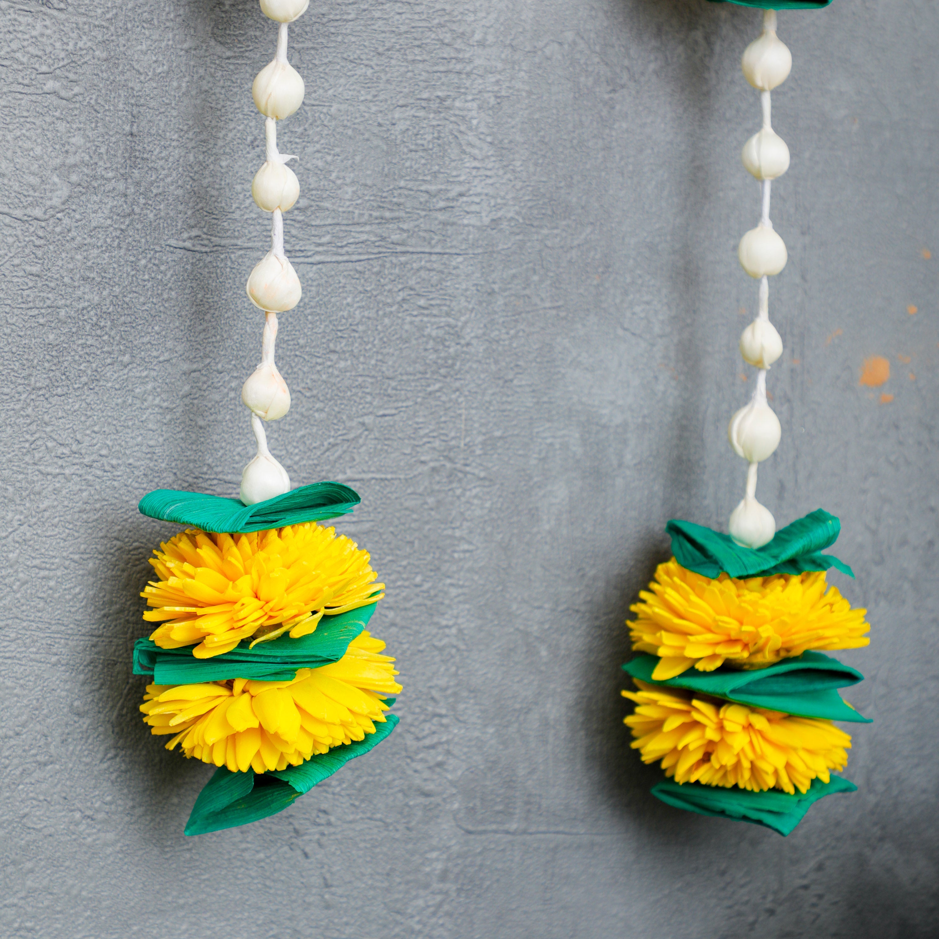 The garland is versatile and can be used for various occasions such as home decorations, weddings, cultural programs, and puja rituals.