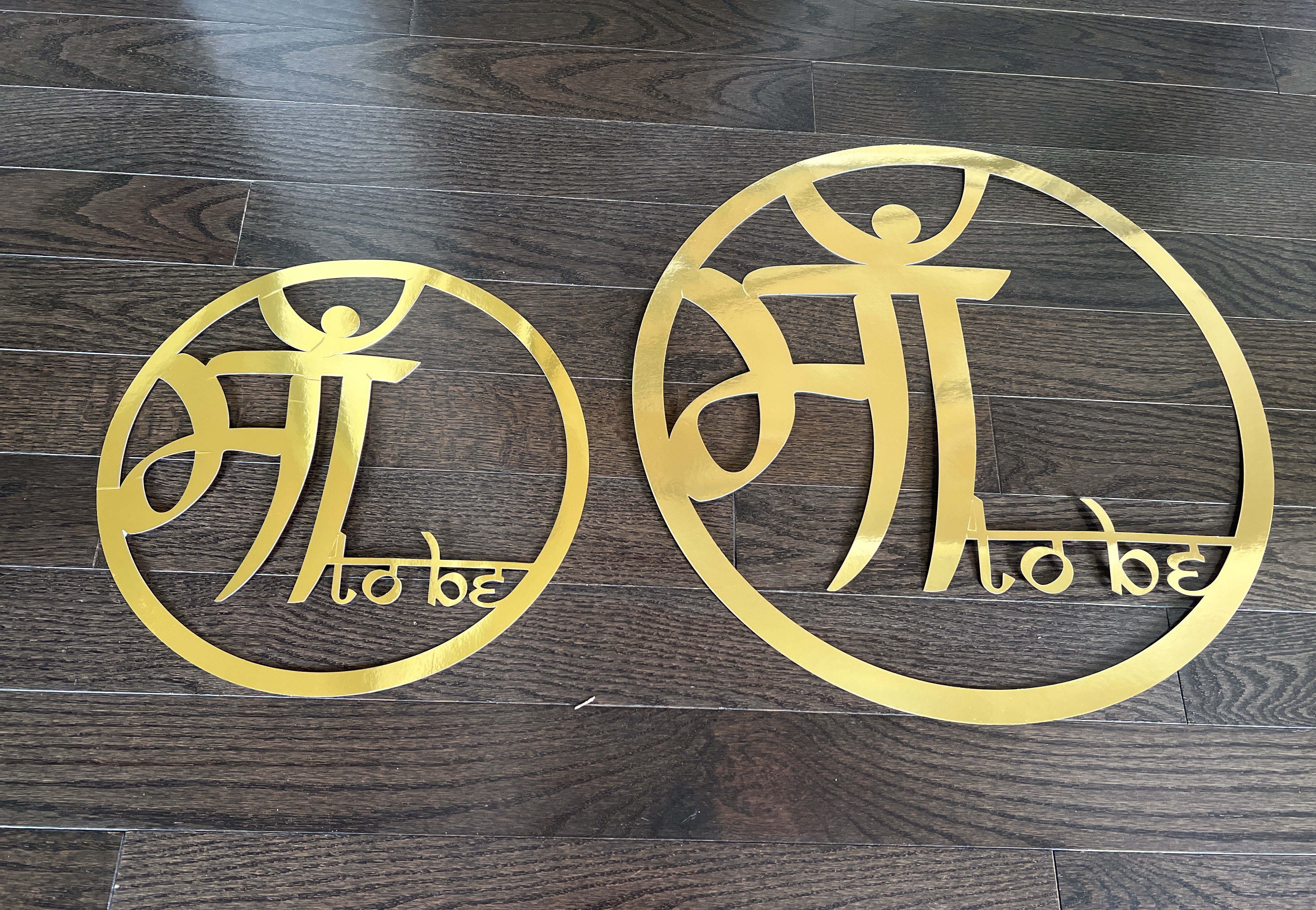 Gold cutouts for 'Mom to Be' celebrations